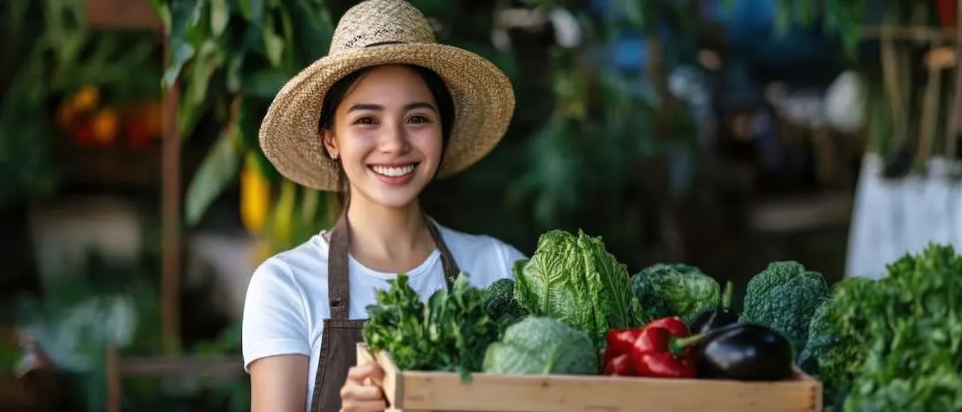 smiling-woman-holding-crate-fres